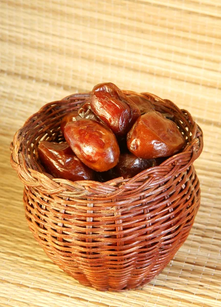 Dates in the bamboo jar — Stock Photo, Image