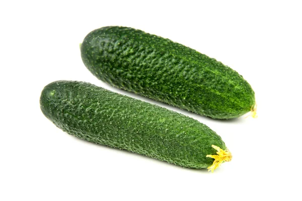 Twee komkommers op witte achtergrond — Stockfoto