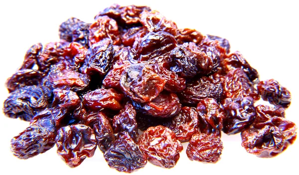 Heap of raisin on white background macro — Stock Photo, Image