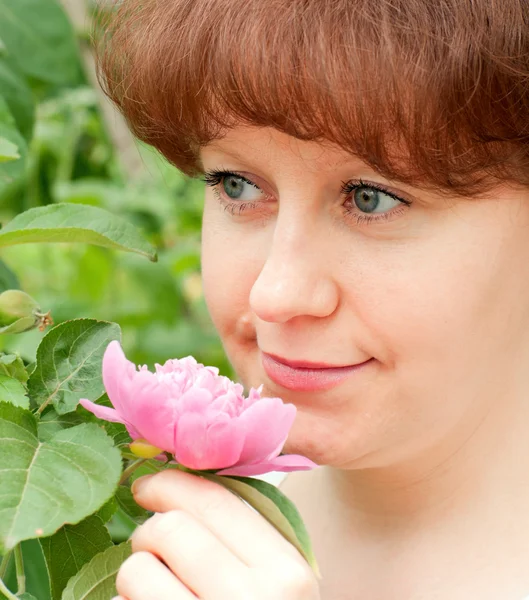 stock image Portrait of a woman in a garden