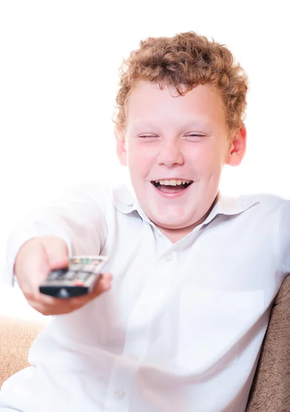 Een tiener met een afstandsbediening — Stockfoto