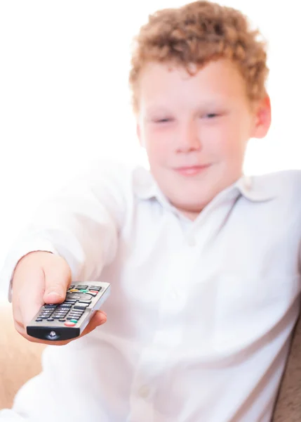 A teenager with a remote control — Stock Photo, Image
