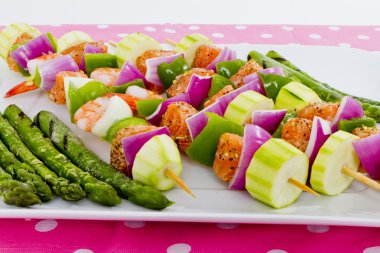 Seafood Skewers are Ready to go on the barbecue. clipart