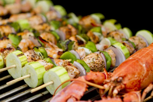 Salmon Skewers and Lobster — Stock Photo, Image