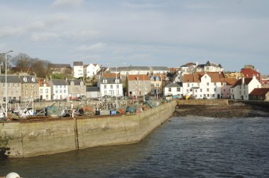 Harbour boats and town of Pittenweem clipart