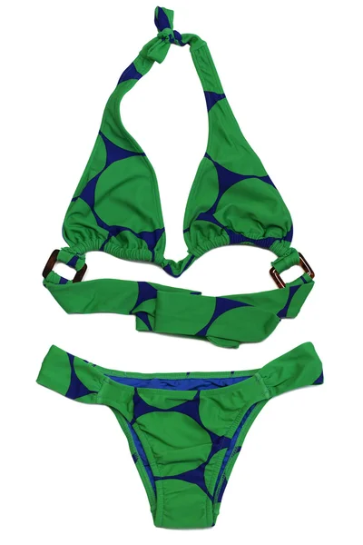 Bikini in het groen op een witte achtergrond — Stockfoto