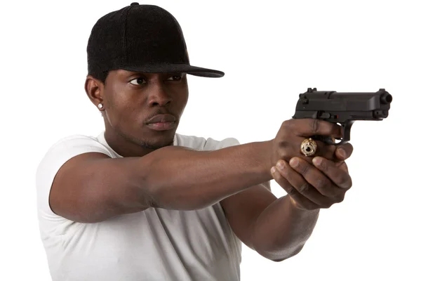 Jovem bandido com uma arma — Fotografia de Stock