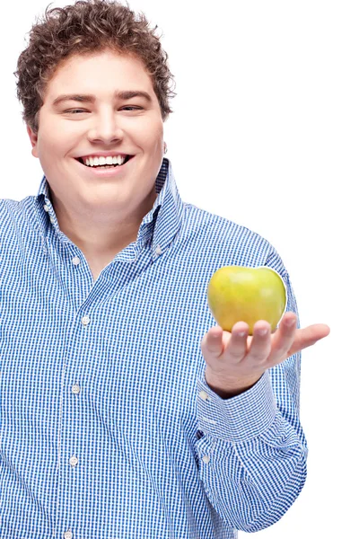 Gordinha homem segurando maçã — Fotografia de Stock