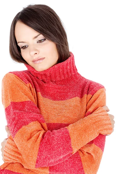 Carina donna bruna in un maglione di lana rosso-arancio — Foto Stock