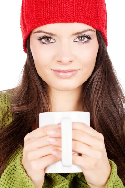 Pretty brunette girl holding a teapot — Stock Photo, Image