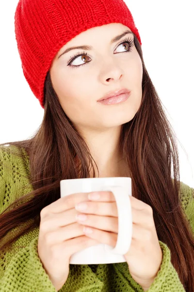 Pretty brunette girl holding a teapot — Stock Photo, Image