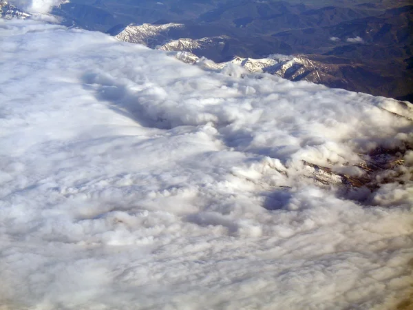 Wolken uit het vliegtuig — Stockfoto