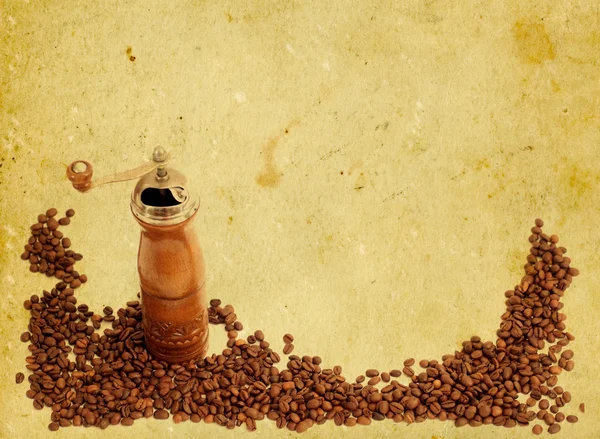 Coffee grinder on vintage background — Stock Photo, Image