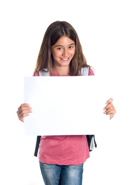 stock image Schoolgirl holding blank paper