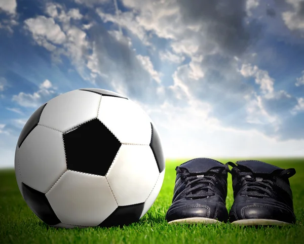 Soccer ball and shoes — Stock Photo, Image