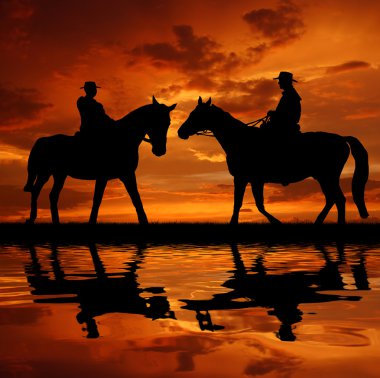 Silhouette cowboys clipart