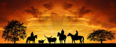 Silhouette cowboys with horses clipart