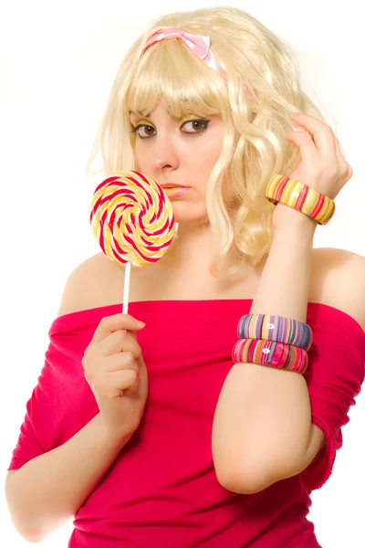 Woman in blond wig with lollipop — Stock Photo, Image