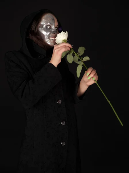Two-faced witch holding the rose — Stock Photo, Image