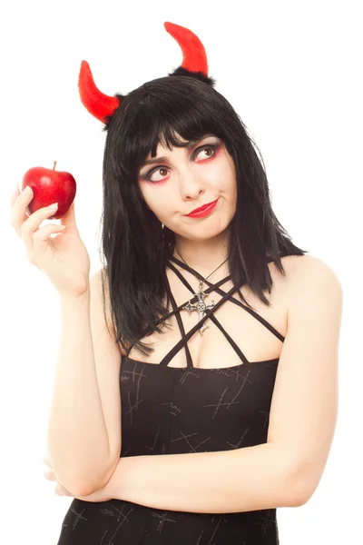 Unzufriedene Hexe mit rotem Apfel — Stockfoto