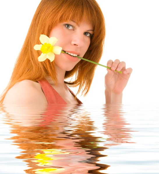 Young girl with a flower — Stock Photo, Image