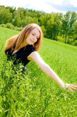 Young woman on the field clipart