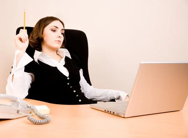Young businesswoman sitting in the chair — Stock Photo, Image