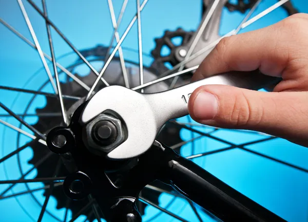 Repairing bike — Zdjęcie stockowe