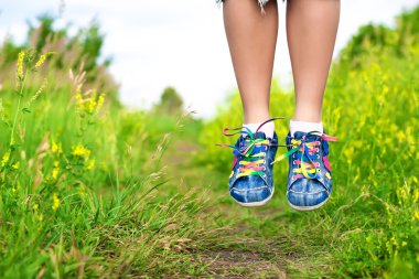 Woman's legs in a jump clipart