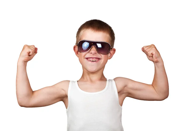 Chlapec ukazuje své svaly, izolované na bílém — Stock fotografie
