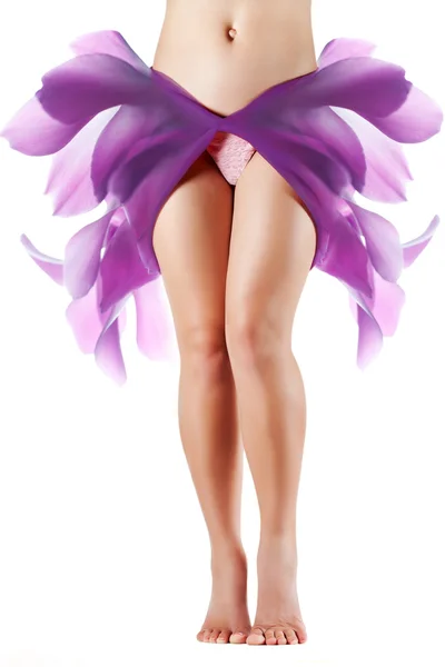 Woman body with petals on her hips — Stock Photo, Image