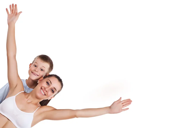 Happy mother and son are doing exercises — Stock Photo, Image