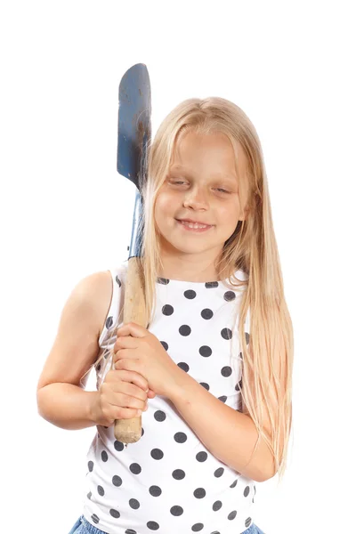 Flicka med en spade — Stockfoto