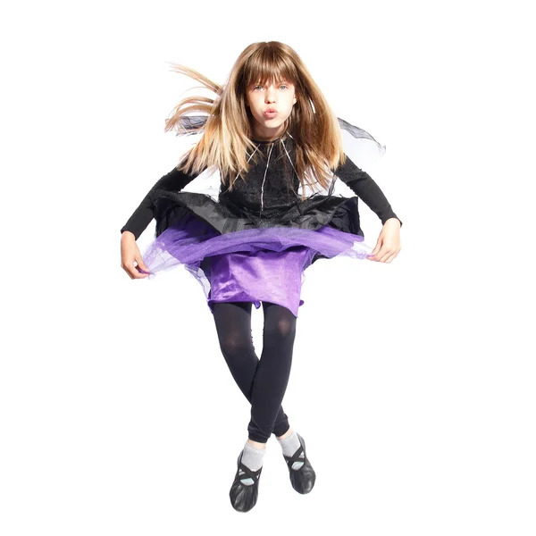 stock image Jumping girl in bat costume