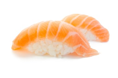 Closeup of delicious japanese salmon sushi isolated on white clipart