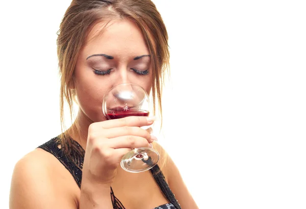 Flickan dricka ur ett glas — Stockfoto
