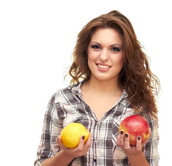 Holding een citroen en een appel — Stockfoto