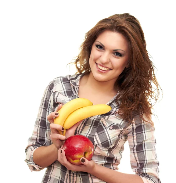 Drží jablko a banán — Stock fotografie