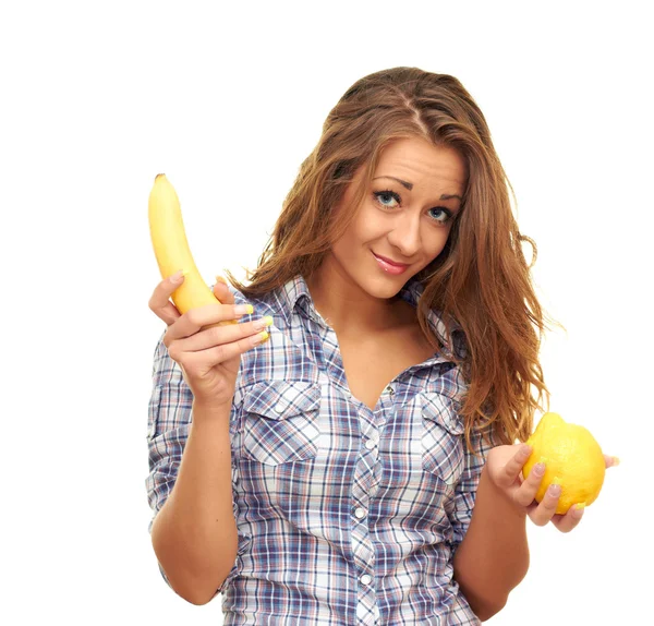 Девушка с бананом и лимоном — стоковое фото