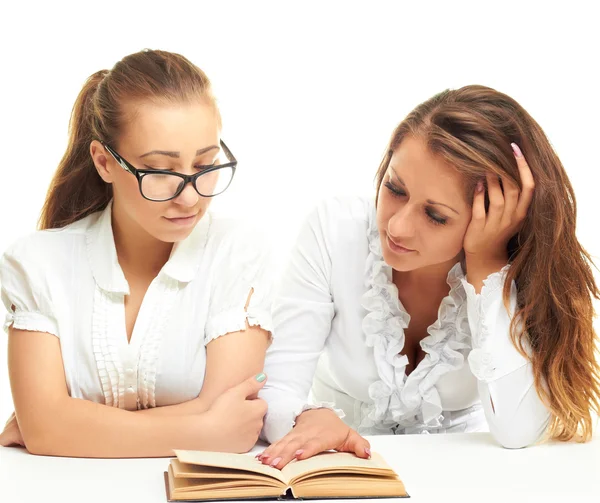 Two girls reading a book — Stock Photo, Image