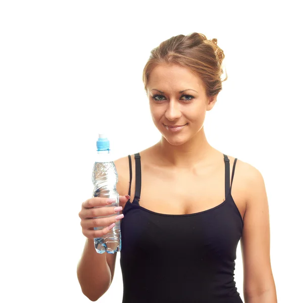 Ragazza con una bottiglia di acqua minerale — Foto Stock