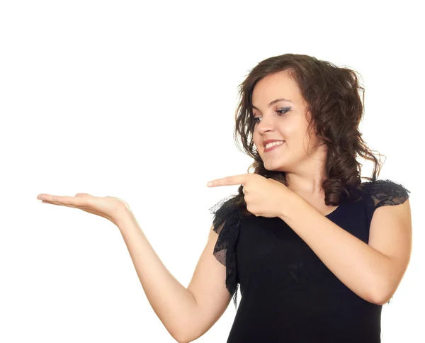 The girl holds an imaginary object in his right hand and points — Stock Photo, Image
