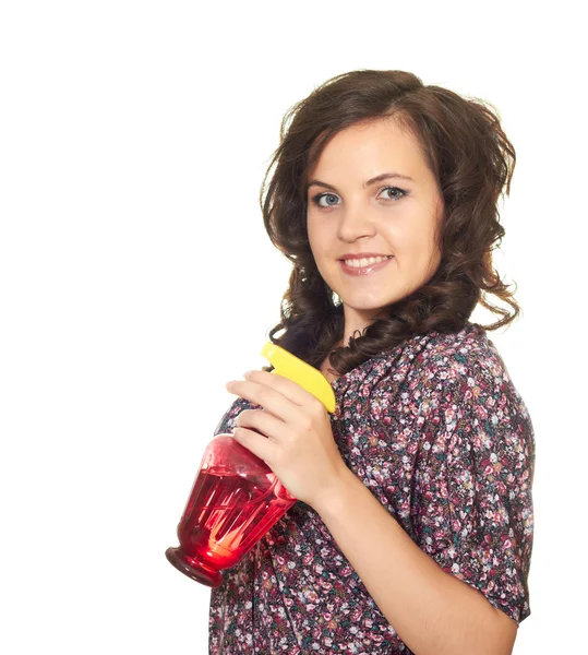 Vacker flicka håller i sin vänstra hand spray vatten — Stockfoto
