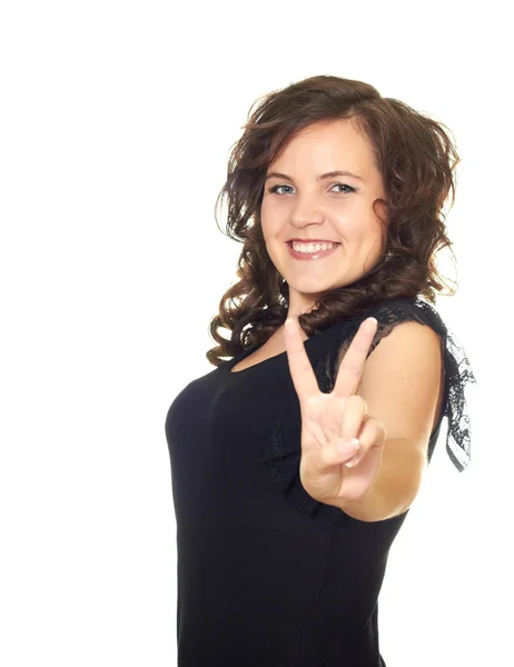 Meisje toont haar handen een symbool van de overwinning — Stockfoto