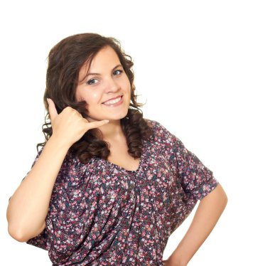 Beautiful young woman showing us a call me sign clipart