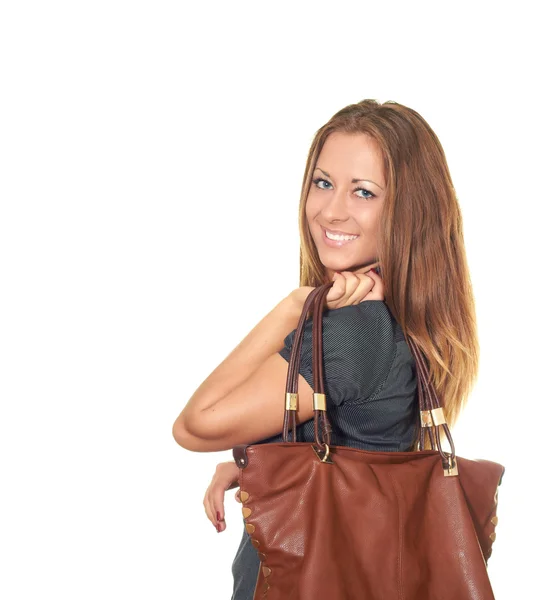 Attraktiv pige i en sort bluse holder i sin venstre hånd en brun - Stock-foto