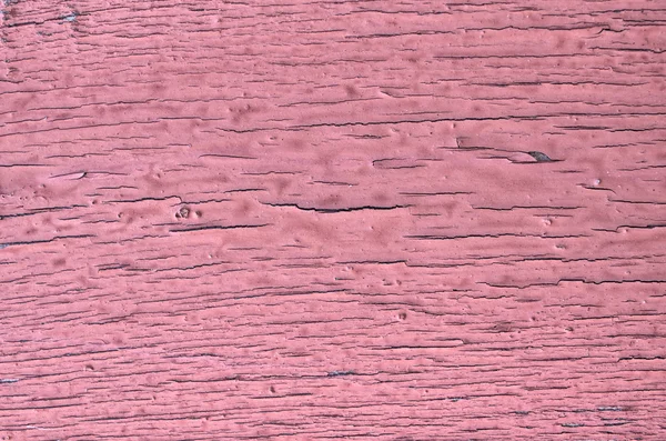 Abgebrochene Farbe an rosa Wand — Stockfoto