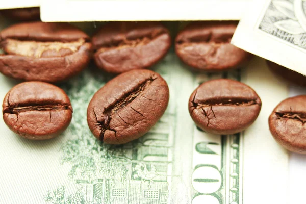Coffee against dollar — Stock Photo, Image
