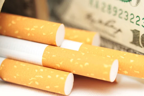 stock image Filters of cigarettes close up cigarettes and Dolar