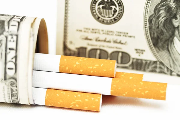 Filters of cigarettes close up cigarettes and Dolar — Stock Photo, Image